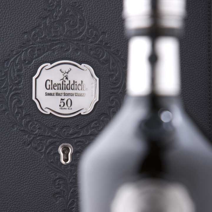 Glenfiddich 50 YO bottle box with blurry bottle in the foreground